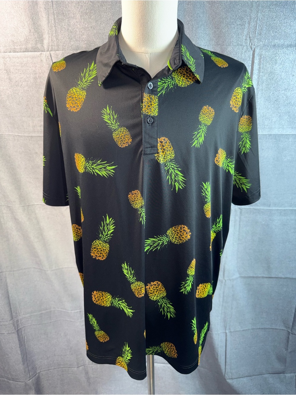 1750-Birdies Black Polo with Yellow & Green Pineapple Print